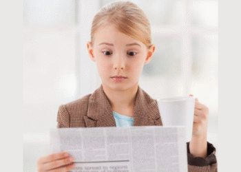 kid-reading-news-paper