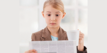 kid-reading-news-paper